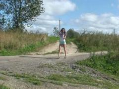 Raunchy Teenage Candy Pees On An Empty Dirt Road