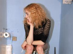 Curly Teenage Bimbo Has Fun With An Anonymous Gloryhole