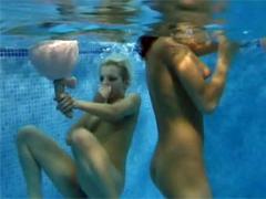 Two Teenage Girls Using Their Blowup Dolls For Flotation