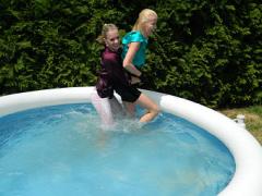 Clothed Daring Lesbian Babes Getting Wet In The Big Garden