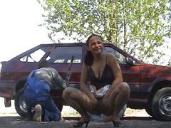 Gorgeous Babe Flashes Pussy Next To A Car Mechanic