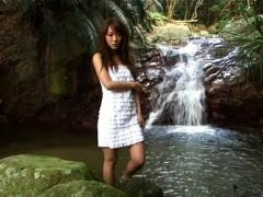 Yuko Shimizu Asian In Short Pants And Boots Walks On A Bridge