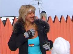 Two Cute Teenage Girls Throwing Snow Balls At Eachother